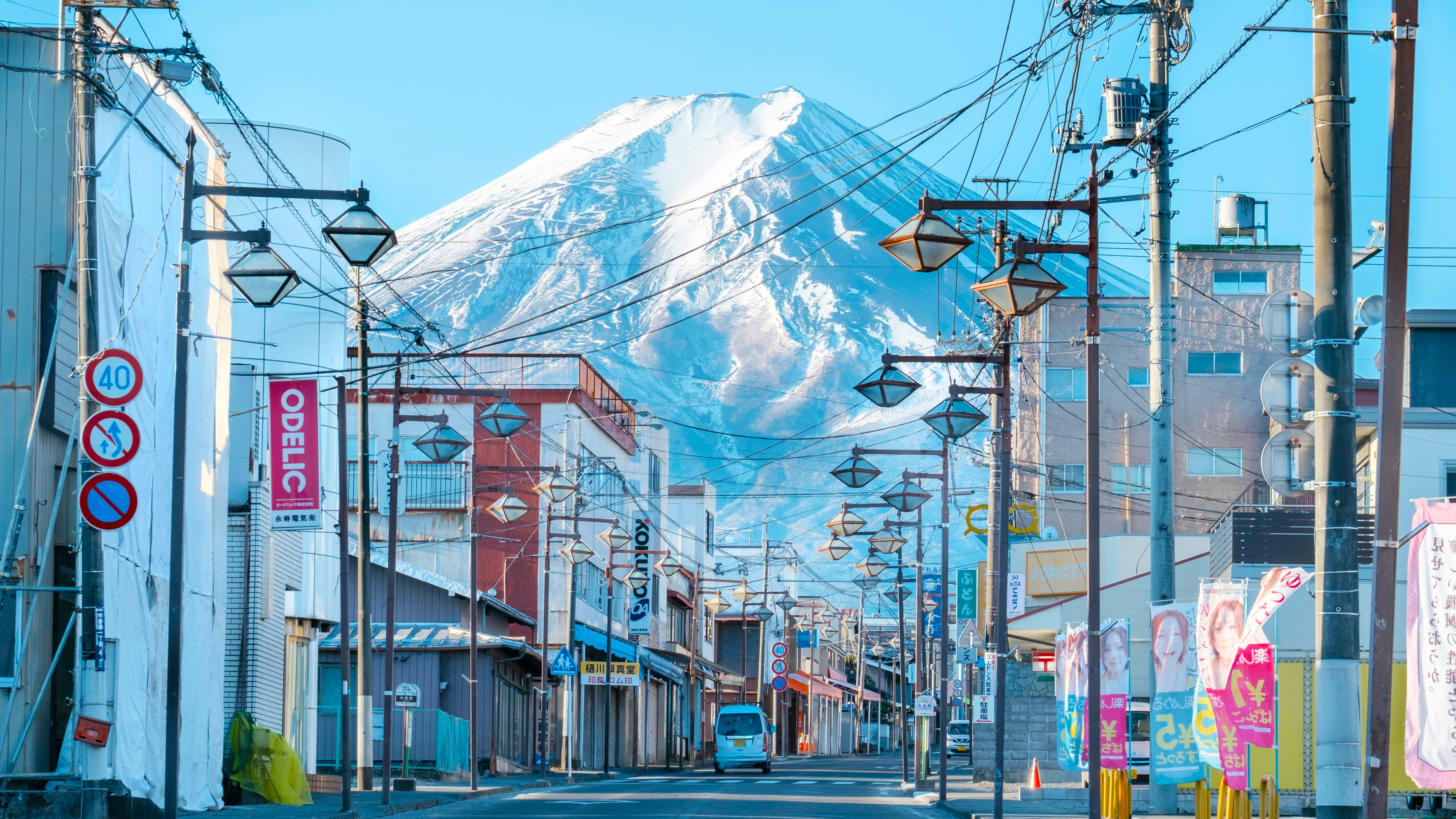 Street view with Mount Fuji in the background on a clear day